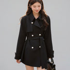 Black elegant trench coat for women with long sleeves and refined design